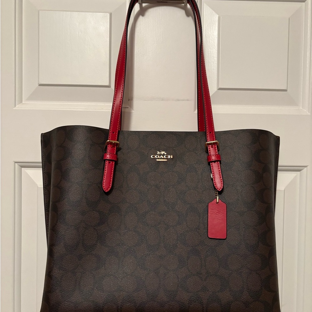 Coach monogram tote bag with red leather interior NWOT
